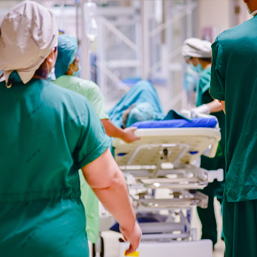Nurses rushing with a patient